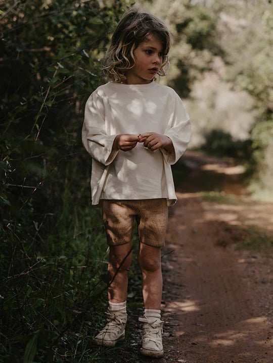 High Rise Bike Short from Girlfriend Collective. Discover ethically-made,  sustainable fashion at OAT & OCHRE. Our slow fashion collections features  organic cotton and timeless designs. Shop now for classic, minimal styles.